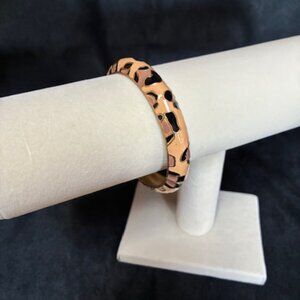 Bracelet - black, brown and tan with tension band.